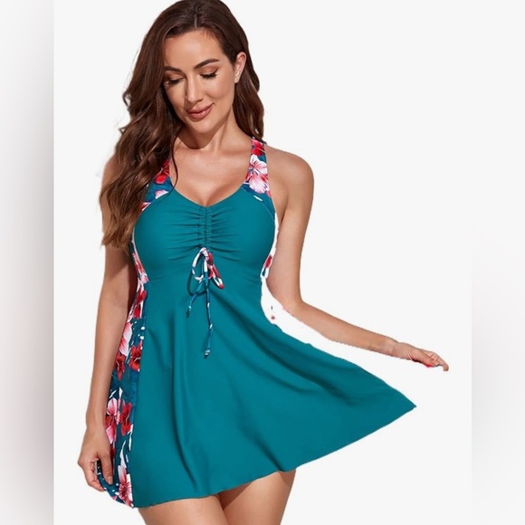 Floral Teal Swim Dress
Casual and elegant
Full coverage black bottom brief - Picture 1 of 8